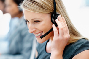 female call center agent with blonde hair listening to call