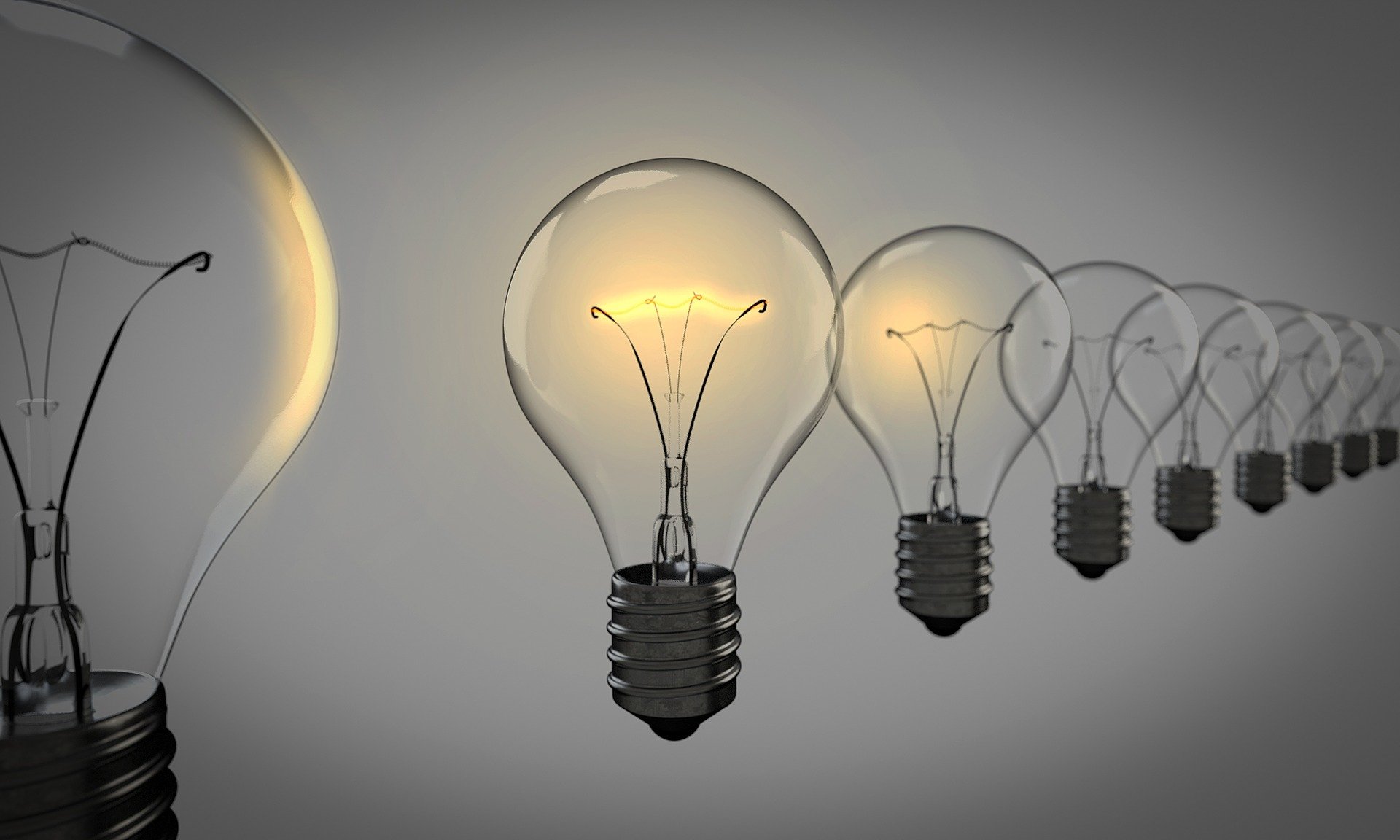 light bulbs lined up on a dark background