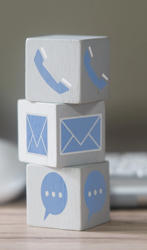 blocks showing a phone, email and text communication