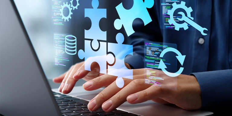 hands typing on a keyboard with a puzzle and other icons floating over it